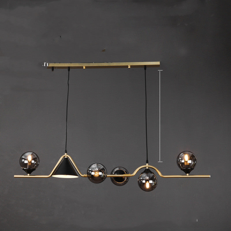 Suspension design à globes en verre et laiton