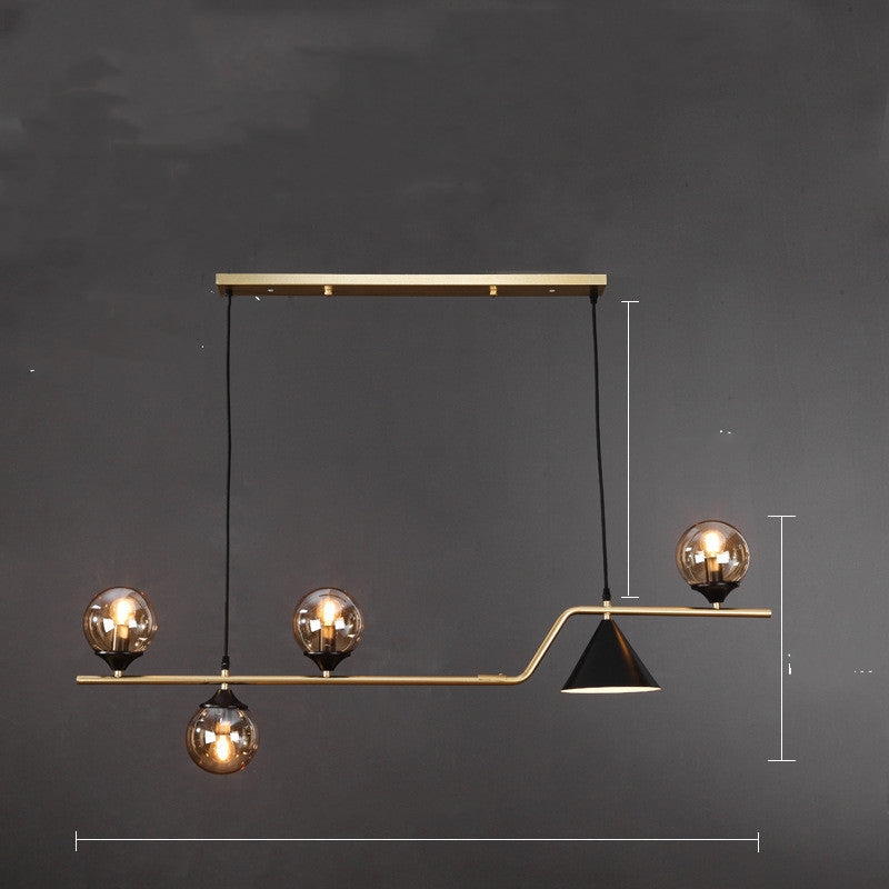 Suspension design à globes en verre et laiton